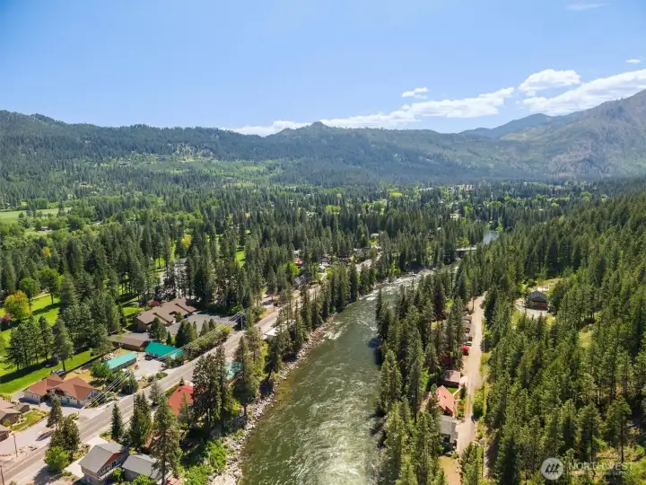 Float on down the river into town, go fishing, biking, hiking, skiing or whatever you lie to do in this amazing home.