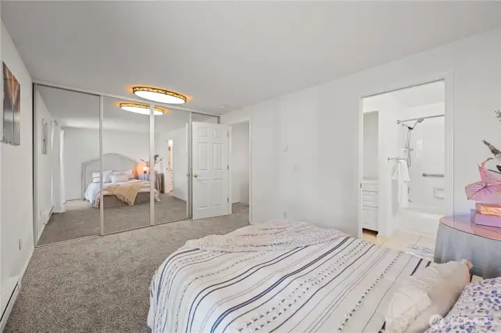 2nd bedroom closets with sliding door to bathroom