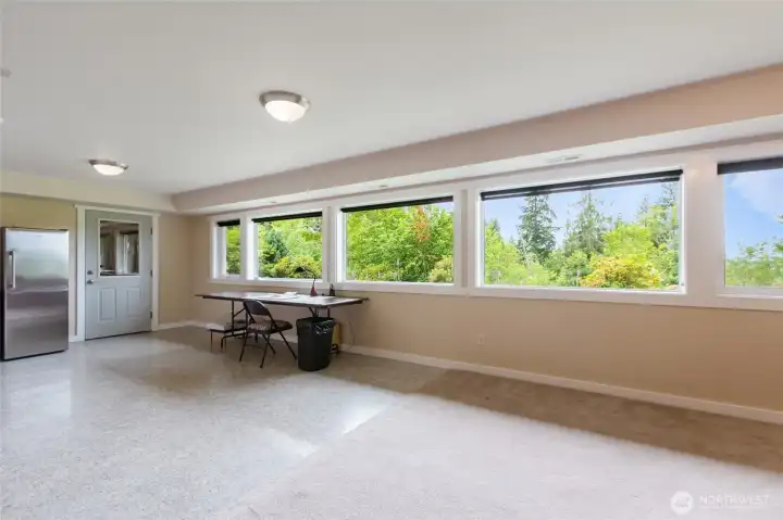 With its generous size and abundant natural light, this versatile lower-level flex space offers endless possibilities. Whether you envision a game room, media room, art studio, home gym, hobby area, or second living room, the open layout can easily adapt to fit your lifestyle.