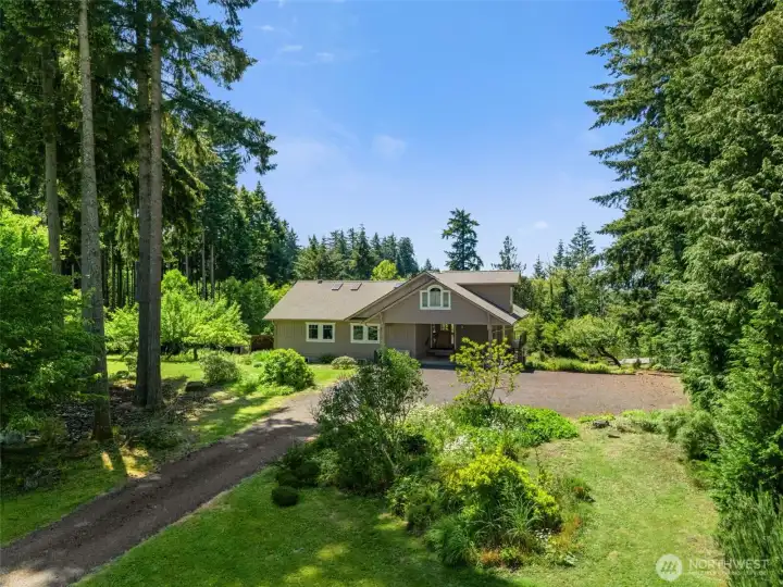 Set back from the road, this property offers a quiet, secluded feel with beautiful views and a peaceful atmosphere. The private setting provides a welcome escape from the hustle and bustle, creating a serene place to relax and unwind.