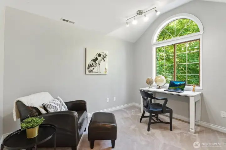 Versatile fourth bedroom with vaulted ceilings is perfect as a home office, playroom, fitness room, guest room, or additional bedroom. Versatile fourth bedroom with vaulted ceilings is perfect as a home office, playroom, fitness room, guest room, or additional bedroom.