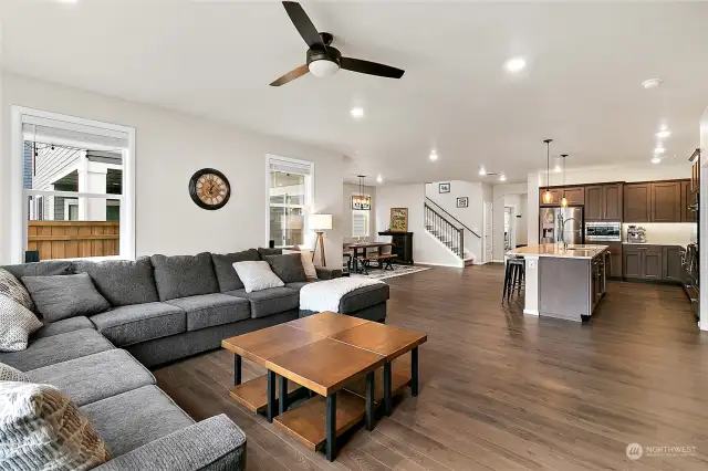 With seamless transitions between the living room, dining area, and kitchen, our home fosters a sense of connection and togetherness.