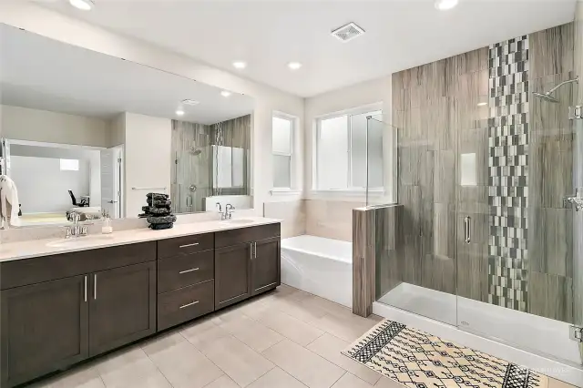 Escape the stresses of the day in the separate tub and shower, where rejuvenation awaits with every soothing drop of water. The spacious walk-in closet adds to the allure, providing ample storage and organization for your wardrobe essentials.