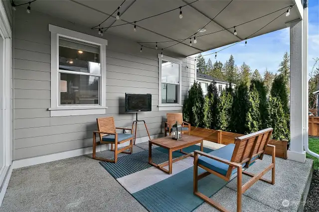 Step into outdoor bliss with our inviting covered patio and an easy to maintain lawn, creating the perfect backdrop for al fresco relaxation and entertainment.