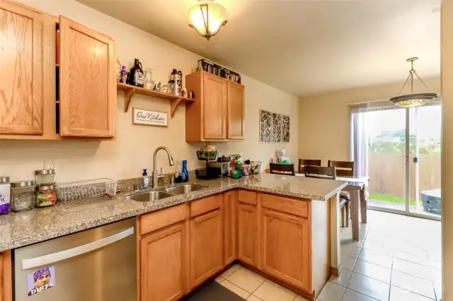 The kitchen was updated in 2019 with granite counter tops, stainless steel appliances, cabinets, tile floors and light fixtures.  (Unit 16124)