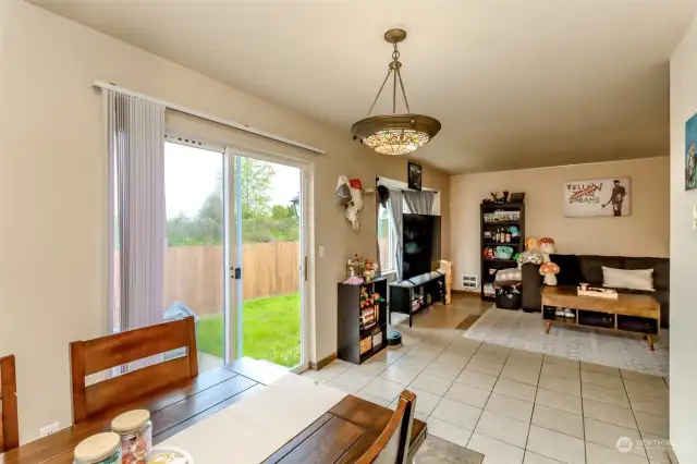 Unit 16124: The dining area opens to the family room which features bay window.