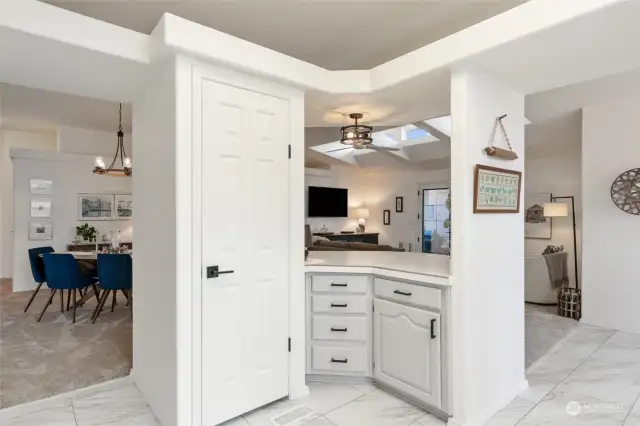 Kitchen paintry and open to dining and family room.