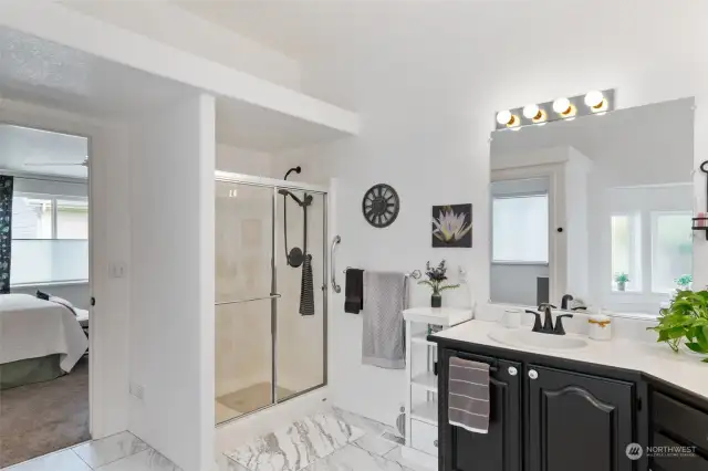 Shower, tub and separated toilet area.