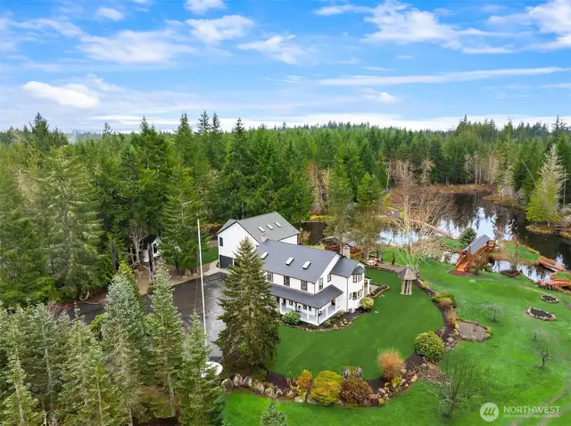 Birds eye view of this charming Main home on the 22.5 acre estate.