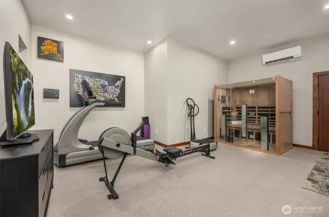 a great space behind the 3 bays in the garage used for a work out room or a flex space.