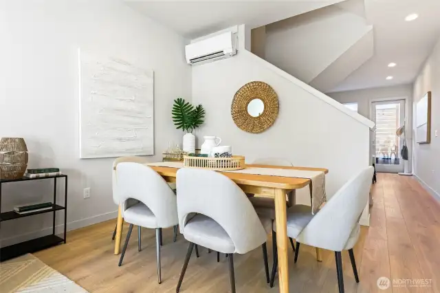 Tucked just off the kitchen, the dining area is warm and inviting—ideal for dinner parties.