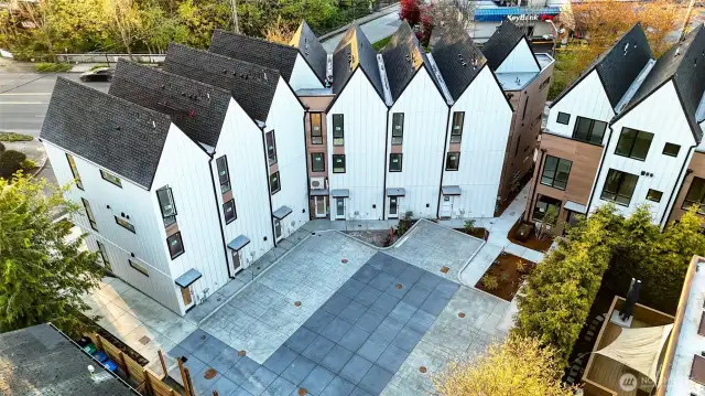 A view of the private community courtyard — clean, open, and thoughtfully laid out for easy access and secure parking.