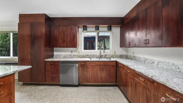 Kitchen offers tons of storage and counter space.