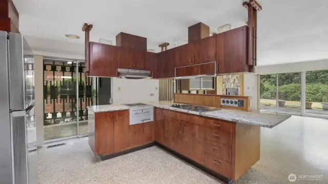 Cooktop conveniently facing the family room, making it easy to converse while cooking.