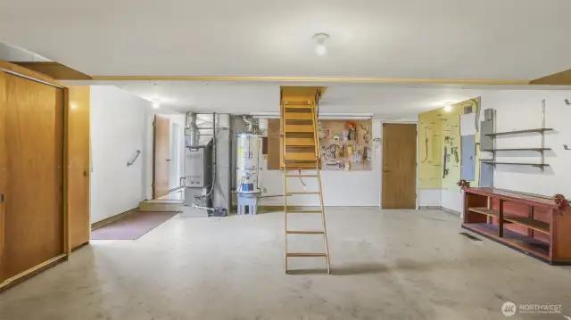 Attached two-car garage houses the furnace & water heater, plenty of room for storage.
