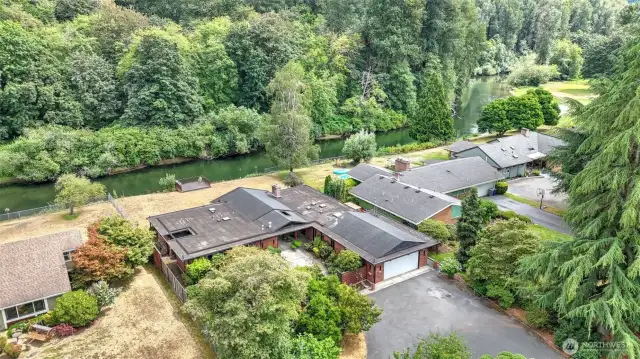 Expansive drive-way with tons for parking in addition to the two-car garage.