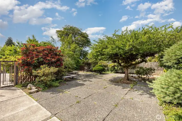 Enjoy the lush greenery from one of the simplistic courtyard benches.
