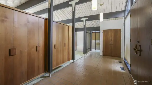 Home features vaulted ceilings and exposed beams throughout.