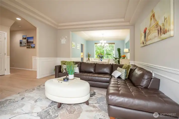 Living Room with Archway to Foyer.
