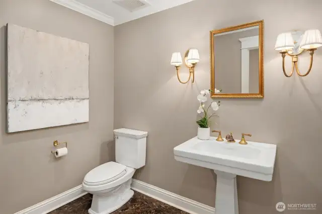 Main floor powder room is simple and elegant.