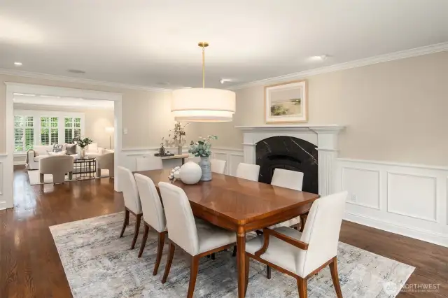 Looking back, we can see how these two rooms flow!  In between them is a hallway to left  (not pictured), with a built in bar, great for entertaining!