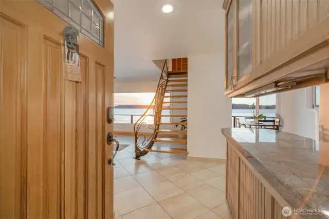 As you enter the home, your first look is the spectacular views of the water.