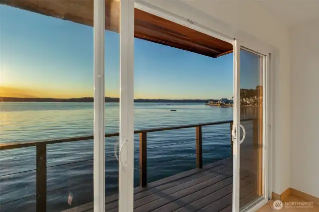 Large slider door opens up to the water as if you're on cruise ship.