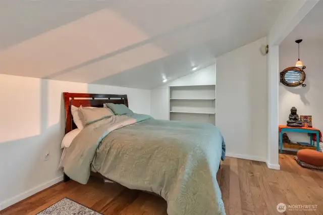 Bedroom is spacious with a touch of classic design.