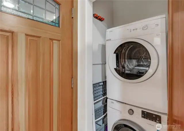 Laundry area discretely tucked away.