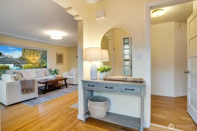 Circular floor plan; the door to the right leads you to the 3 bedrooms on the main floor.
