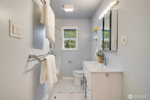 Both bathrooms (one on each floor) have been tastefully updated.