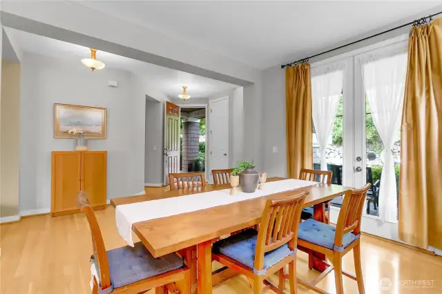 Glass French doors of the dining room lead to covered front porch, which is another nice place to sit and relax.