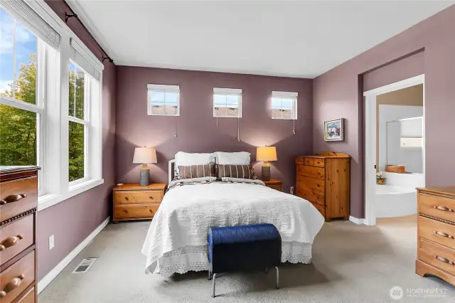 Two large windows overlook the front of the home and three smaller windows overlook the side of the home.