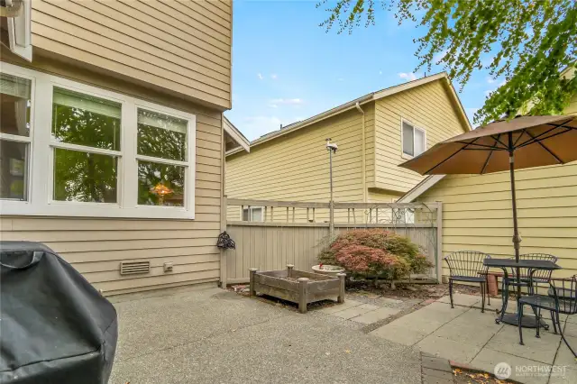 ADDITIONAL UPGRADES and FEATURES: Air conditioning. Hardwood flooring in every room on the main level + extra high ceilings on the main level. Coat closet in the entry area + a deep under-stair closet with lighting. High quality bottom-up / top-down window blinds. Private fully fenced backyard with a private patio.  Front porch, covered sitting area located in the front of the home. Underground sprinkler system in the front yard and backflow test completed in July 2025. Large two car garage in the back of the home that has a door off the kitchen leading into the garage. The garage is accessed by car through the alley located behind the home. Workbench for hobbies and crafts located in the two car garage.