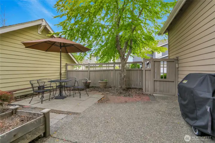 The private fully fenced backyard.