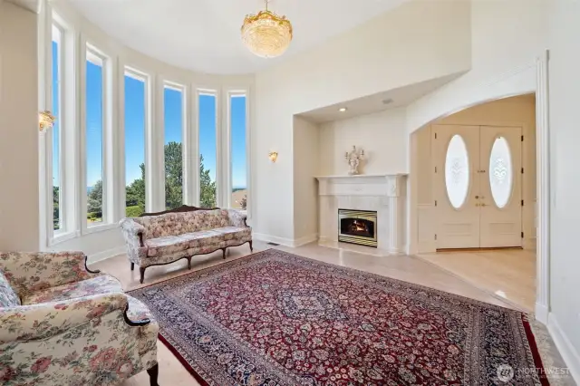 Huge Windows and High Ceilings. One of Two Gas Fireplaces