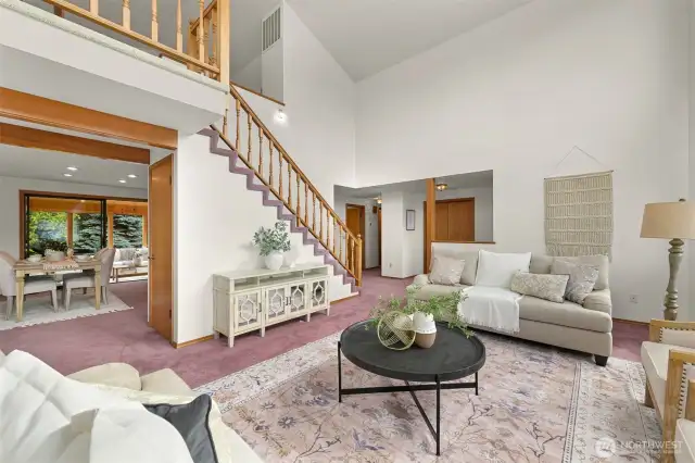 Upstairs takes you to loft primary suite