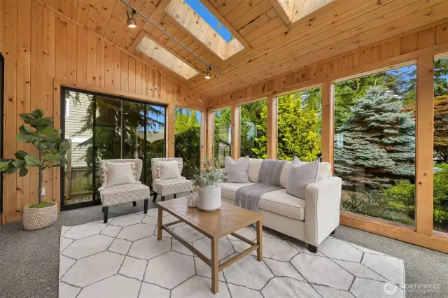 Fabulous sunroom connects main living area and backyard oasis
