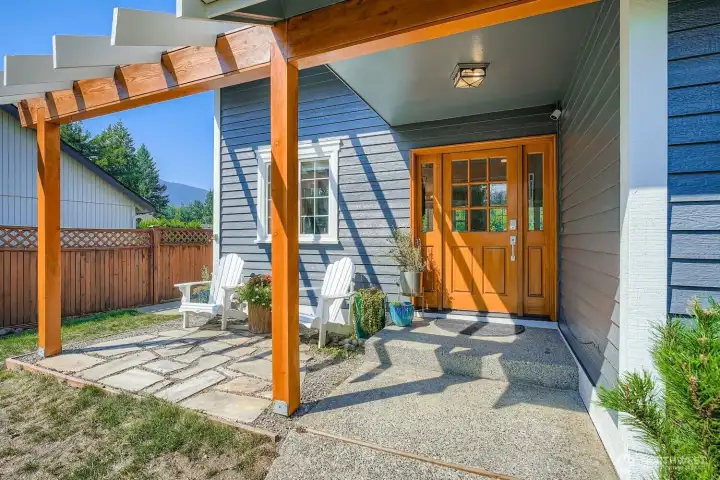 Very welcome front porch with quiet sitting patio.