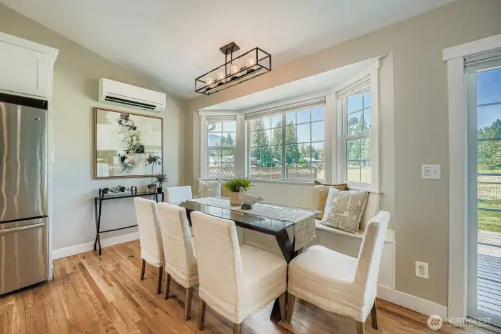 The dining area has a window seat with under storage.