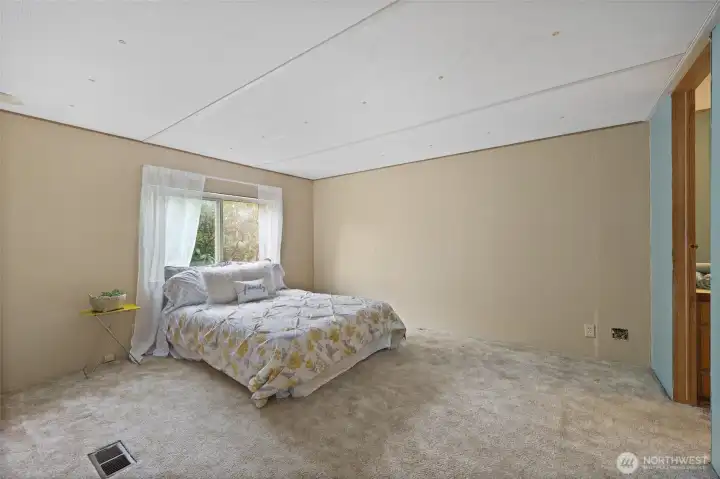Plenty of space for your bedroom suite- walk in closet to left