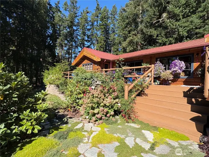 Plenty of great details inside & outside to capture your attention.  The terrific decks across the SW side of this home are truly wonderful.