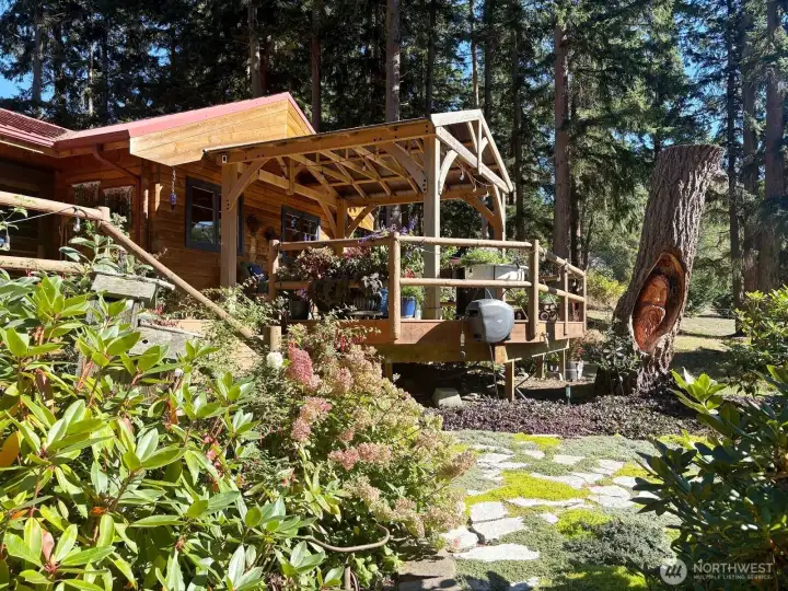 The SW side of the home features an amazing 937 sq foot deck, with covered pavillon. Come see this magical space to enjoy day, night and all year around.