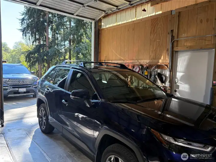 An RV, boat or tall sized truck can easily fit inside both bays.