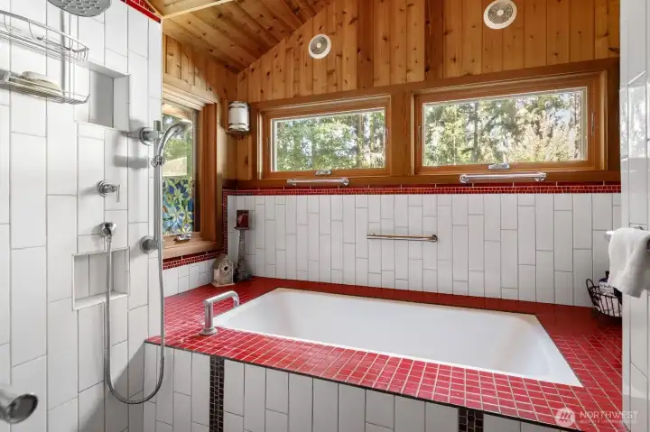 Deep soaking tub with separate shower.