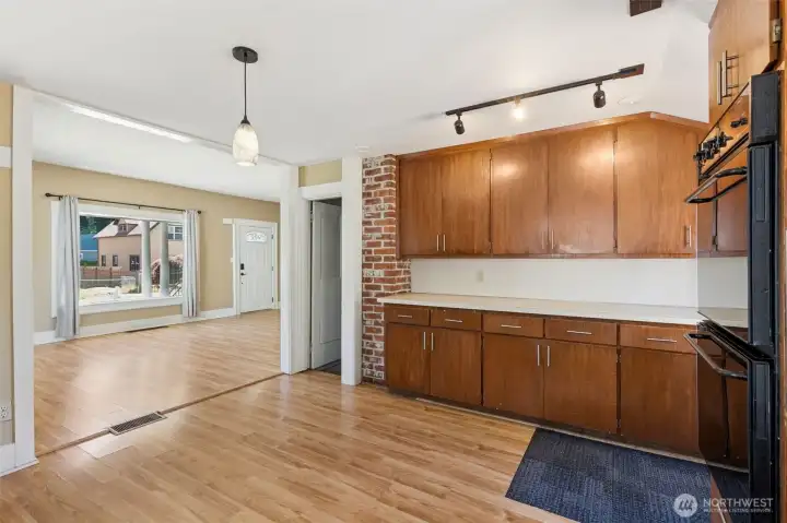 Unit A Kitchen looking back to the Living Room and front entrance.