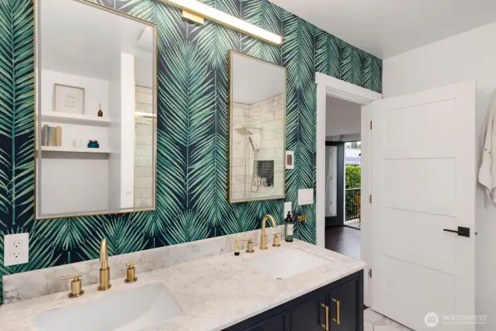 Luxurious ensuite with double vanity, double shower, and heated floors.