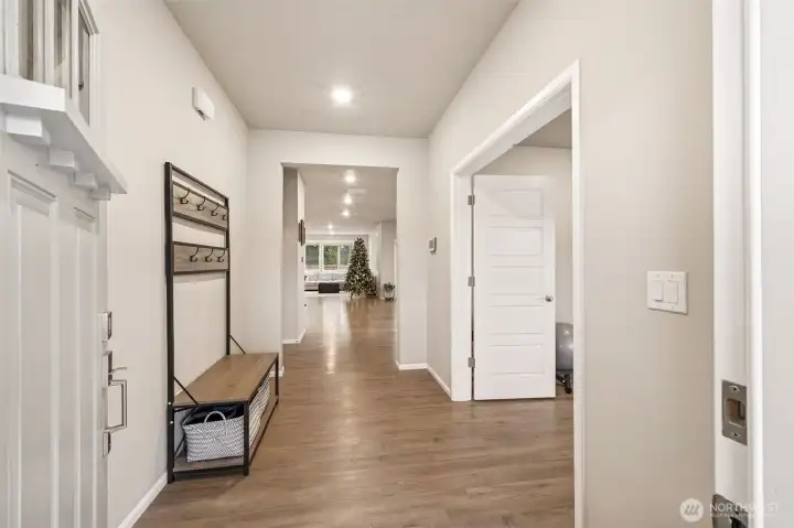 Wide entry way with dedicated office/ den to the right.