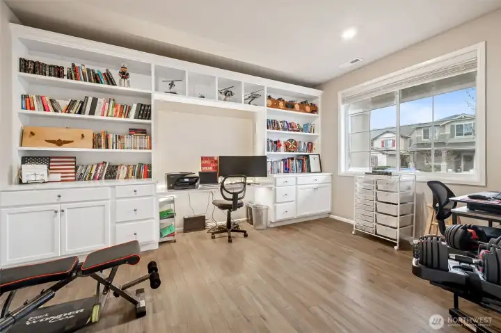 Main floor office with built ins including trim lights