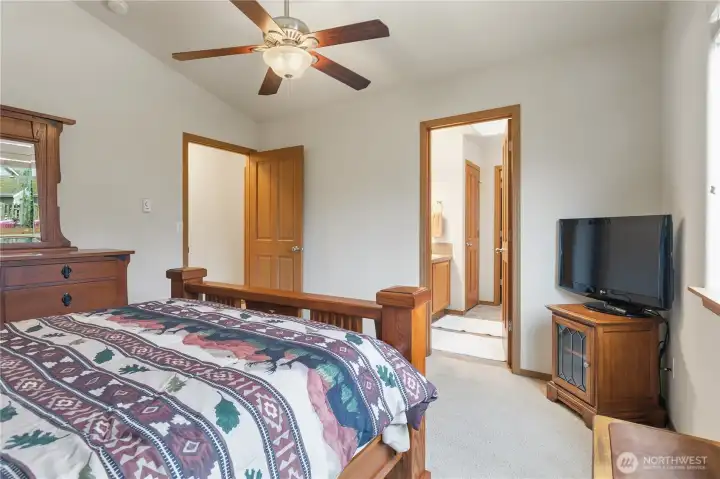 Primary bedroom features vaulted ceilings!